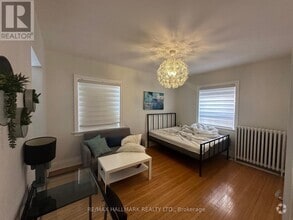 Building Photo - 595-595 St Clair Ave W