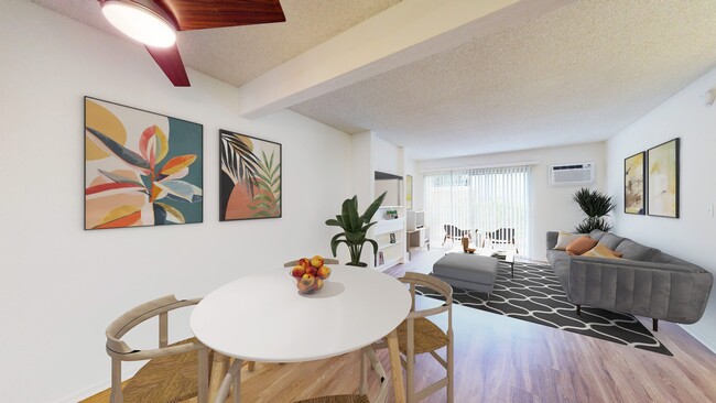 Comedor y sala de estar en Village Pointe Apartment Homes - Village Pointe Apartments