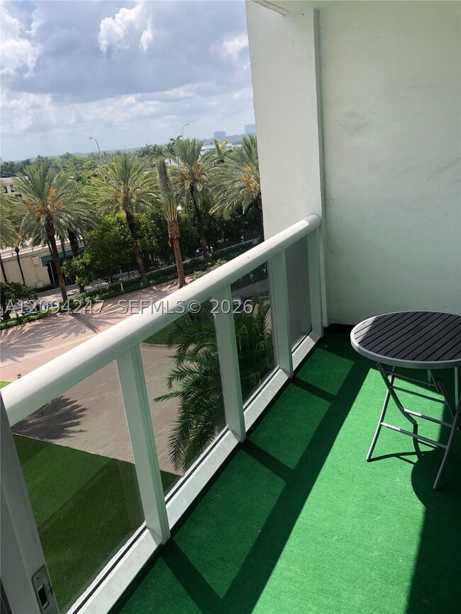 Building Photo - 10275 Collins Ave