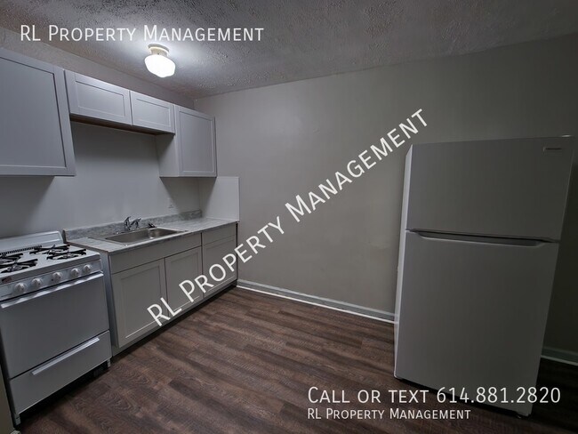 Building Photo - WAIVED APPLICATION FEE WITH APPROVED APPLI...