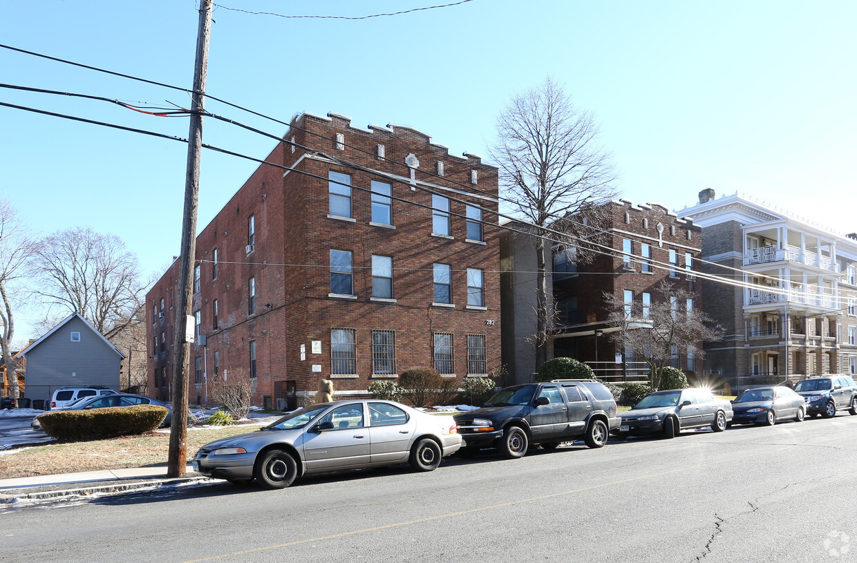 Side of Building Photo - Sigourney Square