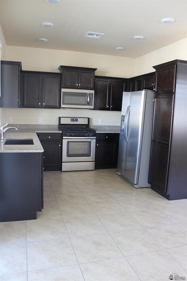 Foto del edificio - 6572 E 35th Pl