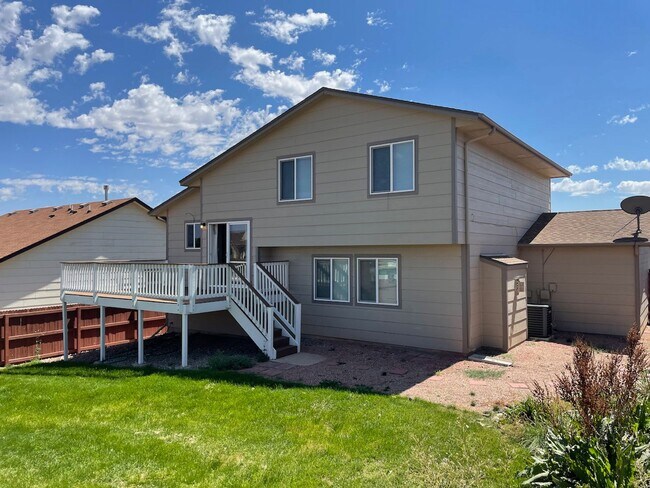 Building Photo - 4 BD/3BA/3 CAR GARAGE with AC in WIDEFIELD!!