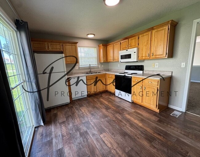 Building Photo - 1401 SE Henley Ct