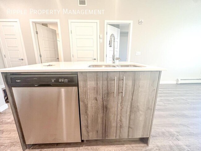 Photo du bâtiment - BRAND NEW 2 BEDS/ 2 BATHS CONDO IN THE COM...