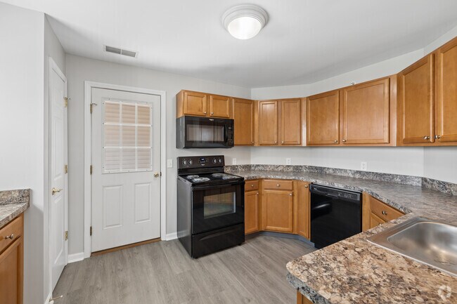 El Buckingham 3 habitaciones, 2 baños - 1,571 pies cuadrados - Cocina - The Ridge Apartments