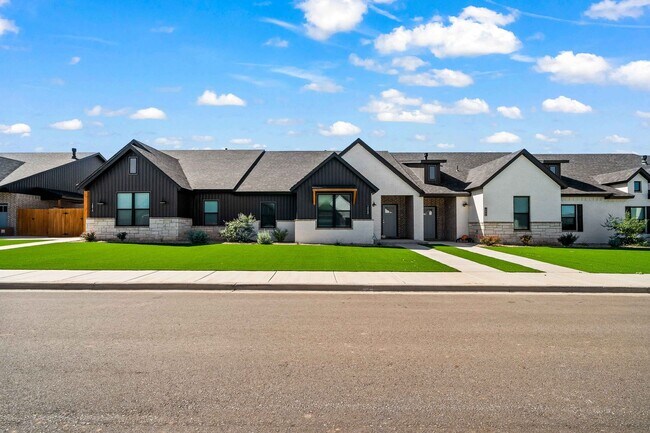 Foto del edificio - New Luxurious Townhome Located In Abbey Gl...