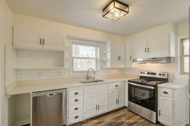 Building Photo - Evolve Real Estate: Welcome to This Spacio...