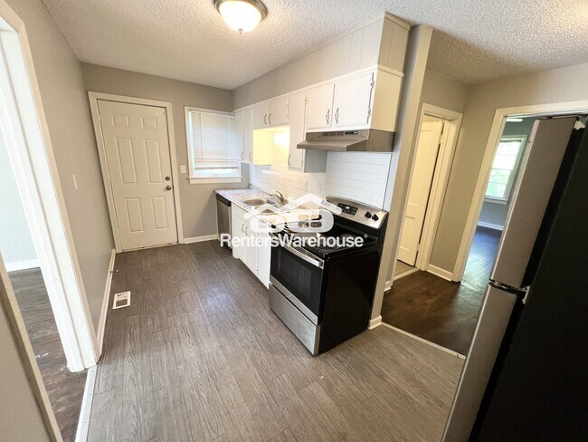 Building Photo - 8510 Woodland Ave