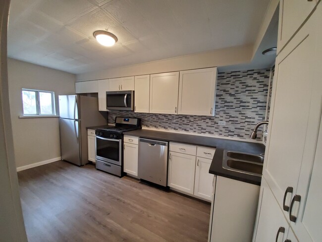 Building Photo - AVAILABLE MAY  - Newly Renovated 3 Bedroom...