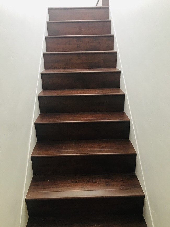 Stairs to Unit from Front Door and Garage - 115 22nd St
