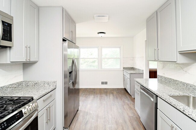 Foto del edificio - Newly Renovated One Level Downtown Residence