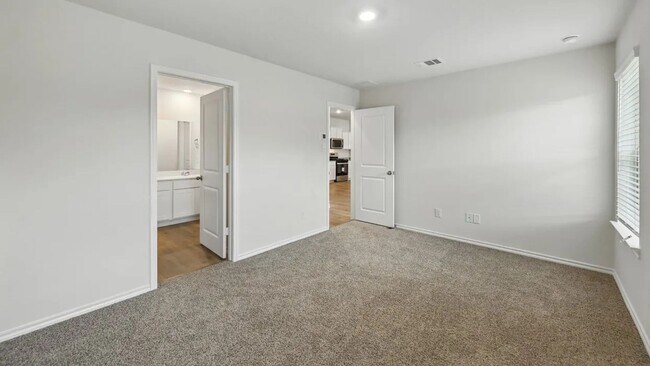 Foto del edificio - Beautiful new 4-bedroom, 2-bath home with an open floor plan, granite kitchen, two-car garage, an...