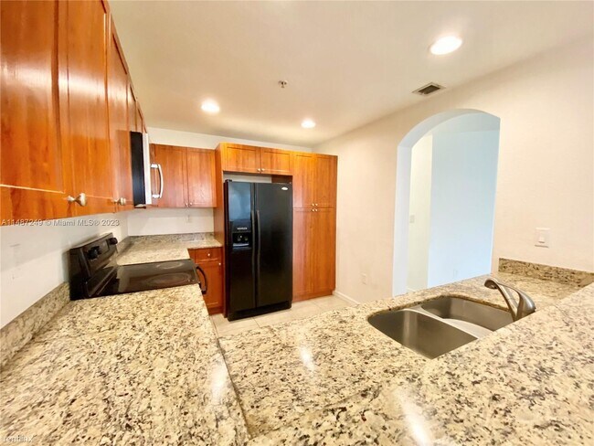 Foto del edificio - 3 br, 2 bath House - 10885 NW 89th Ter Uni...