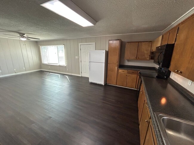 Building Photo - 1/1 Duplex / Fridge, Washer & Dryer Included  / Large Front Deck / Small Fenced in Side Yard/ NBISD