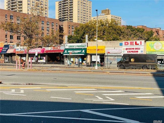 Building Photo - 100-25 Queens Blvd