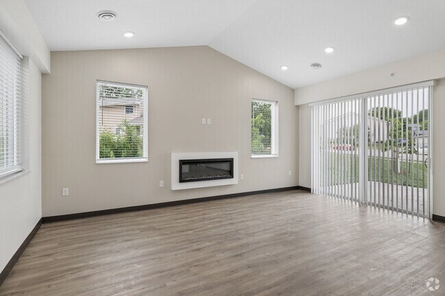 2 habitaciones, 2 baños - 1400 pies cuadrados - Sala de estar - Manor Heights Townhomes