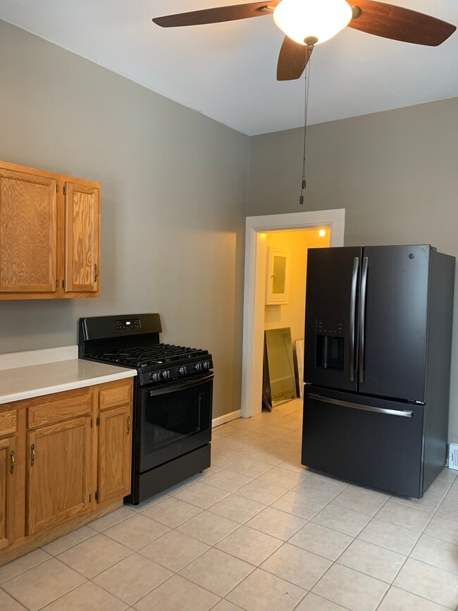 Kitchen: stove/refrigerator/dishwasher - 1329 Jackson St