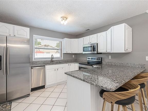 Foto del edificio - 1590 Dinnerbell Ln E