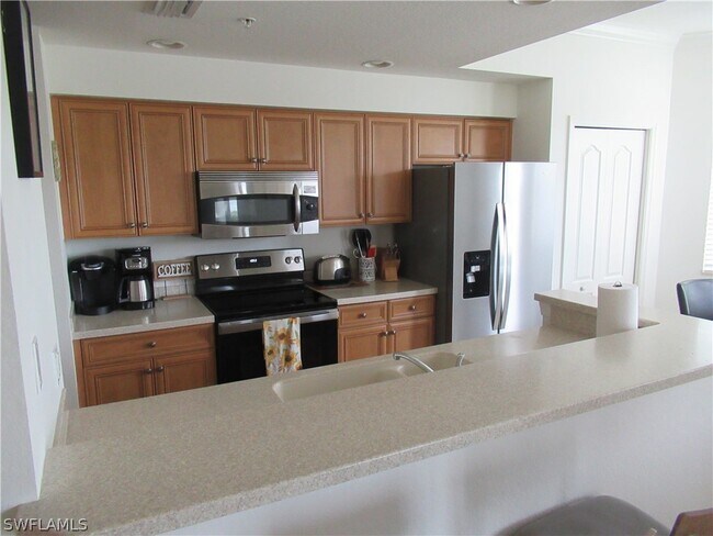 Foto del edificio - 10275 Heritage Bay Blvd