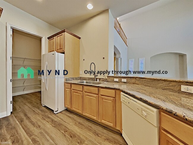 Building Photo - 3 br, 2.5 bath House - 7877 Base Camp Ave
