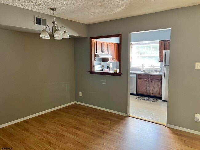Building Photo - 6047 Hoover Dr