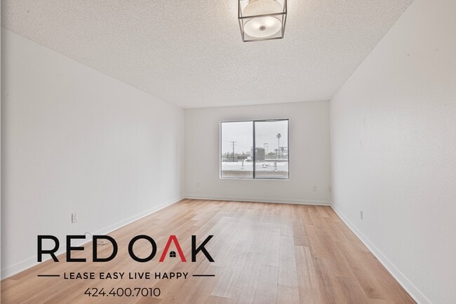 Building Photo - Sun-Drenched One Bedroom with Central Heat...