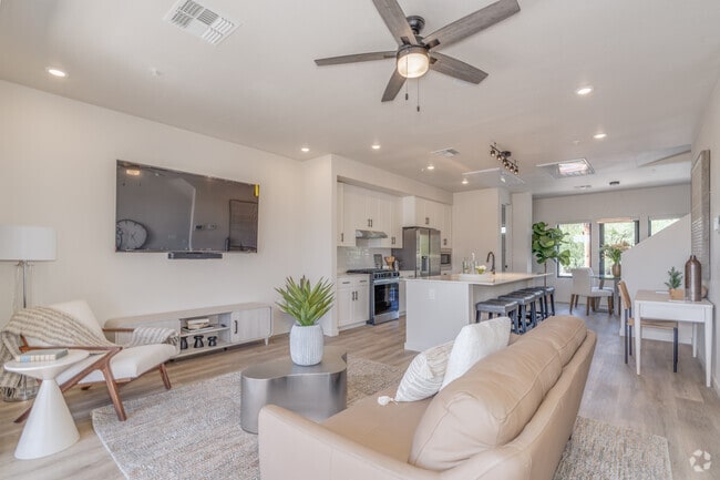 3BR, 2.5BA - 1,543SF - Living Room - Liberty at Estrella Falls