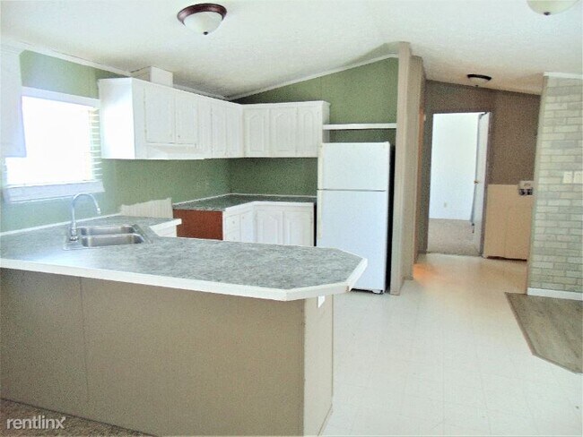Building Photo - 3 br, 2 bath Mobile Home - 3804 N Riata Dr...