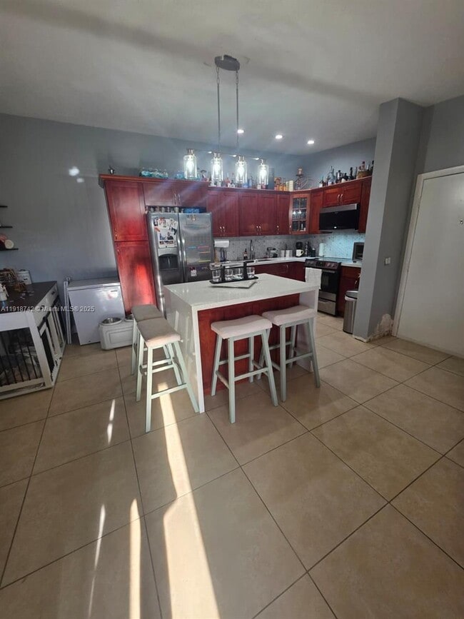 Building Photo - 9727 Hammocks Blvd