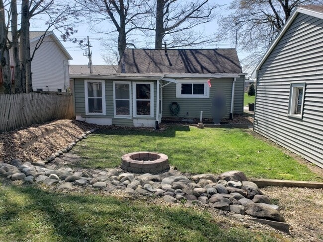Back yard looking at house - 4619 West St