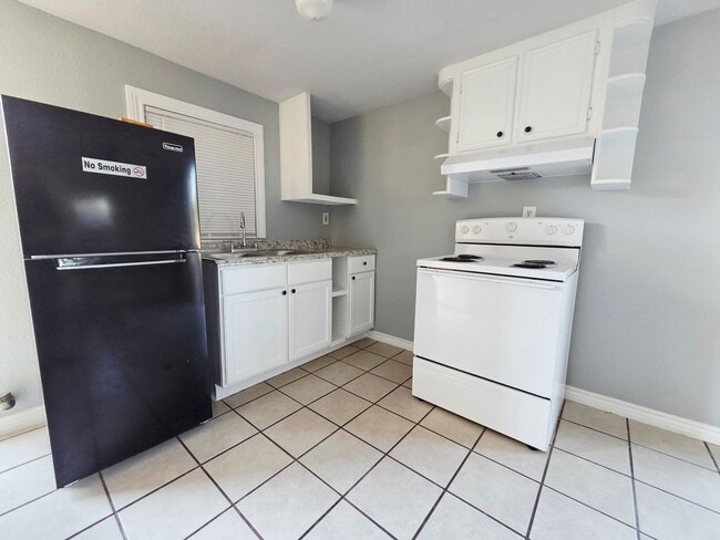 Building Photo - 5403 Ave Q 1/2