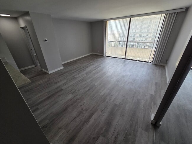 Photo - Fully renovated 1-bedroom, 1-bathroom, with 1 assigned covered parking and In-unit washer/dryer. ... Apartment