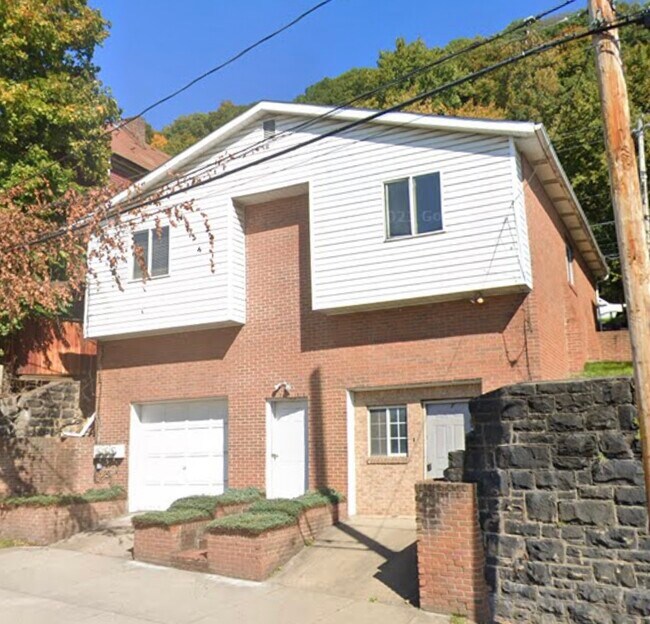 Entrada del apartamento C, puerta inferior derecha - 255 Beaver St