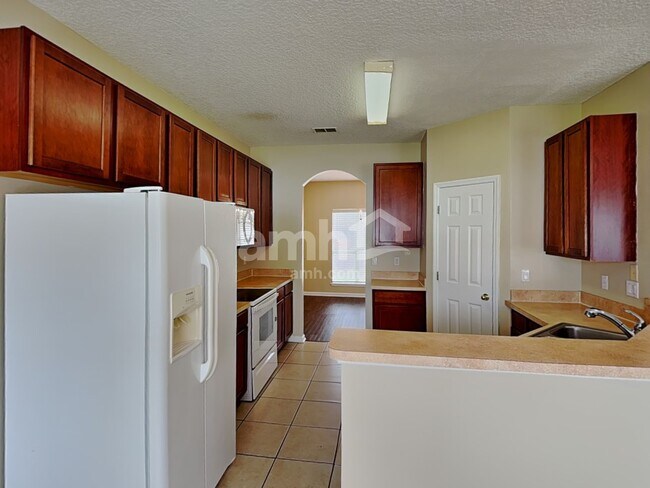 Foto del edificio - 9183 Prosperity Lake Dr