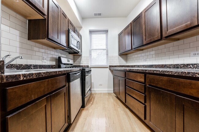 Foto del edificio - 1003 W Sunnyside Ave