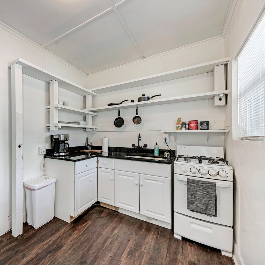 Building Photo - Charming Fully Furnished Studio in the Heart of UT Campus – $1,500/Month