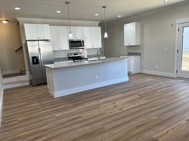 Building Photo - New 3 Bedroom 2.5 Bath Townhouse with Garage