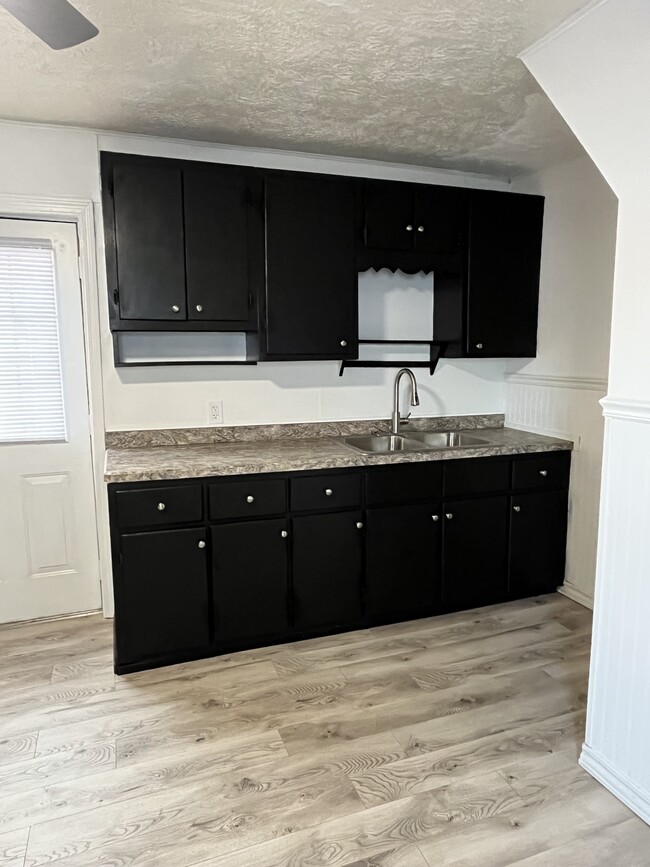 New sink, new faucet, new countertop, plenty of counter space. - 32 Wood Ave