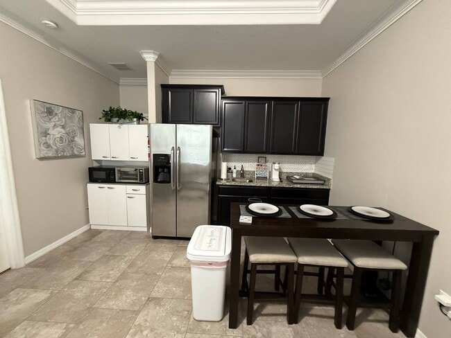 Building Photo - Furnished 1-Bedroom Apartment in Kindred –...