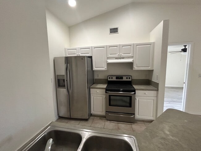Building Photo - Nice 3/2 with newer carpet