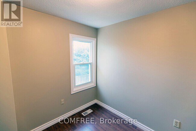 Building Photo - 7591-7591 Scholfield Rd