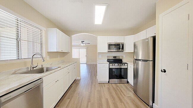 Building Photo - New flooring and paint!  Highly sought aft...