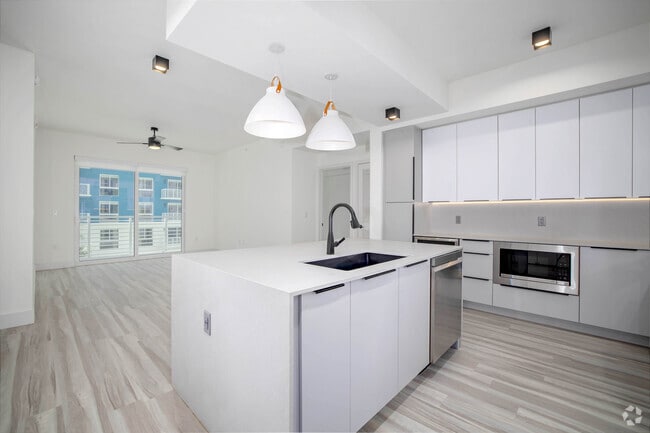 2BR, 2BA - 1176SF - Kitchen & Living Room - Blu Aventura