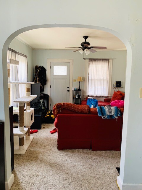 Dining room, looking into the living room and front door. - 211 E Vermilya Ave