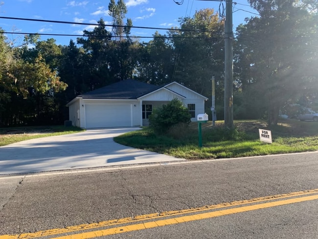 Building Photo - 5871 Collins Rd