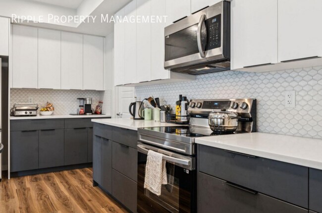 Photo du bâtiment - SPACIOUS 3-BEDROOM CONDO IN CARRINGTON | UNDERGROUND PARKING
