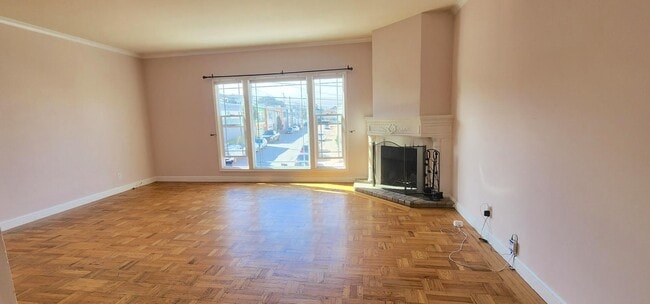 Living Room with ornate Fireplace - 245 Concord St