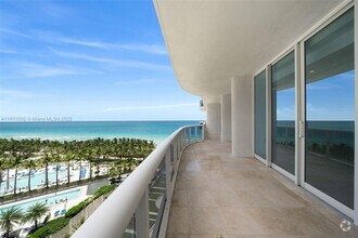 Building Photo - 9601 Collins Ave