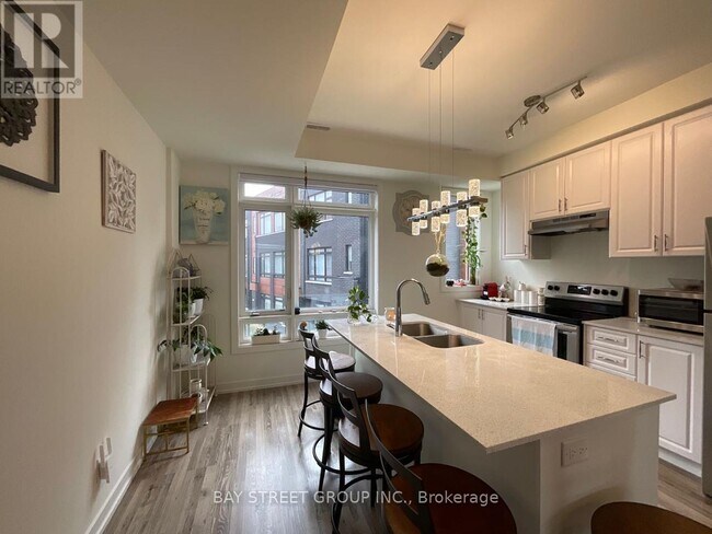 Photo du bâtiment - 370 G Red Maple Rd